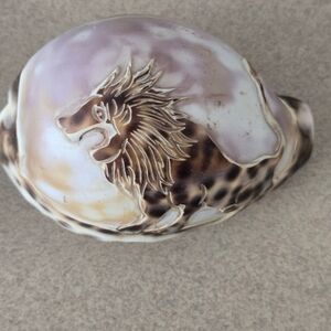 Elegant Lion Ceramic Art in Cream and Brown